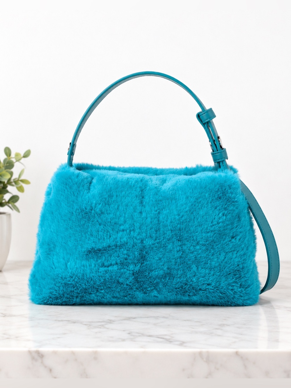SIMON MILLER  Furry Blue Mini Puffin Bag